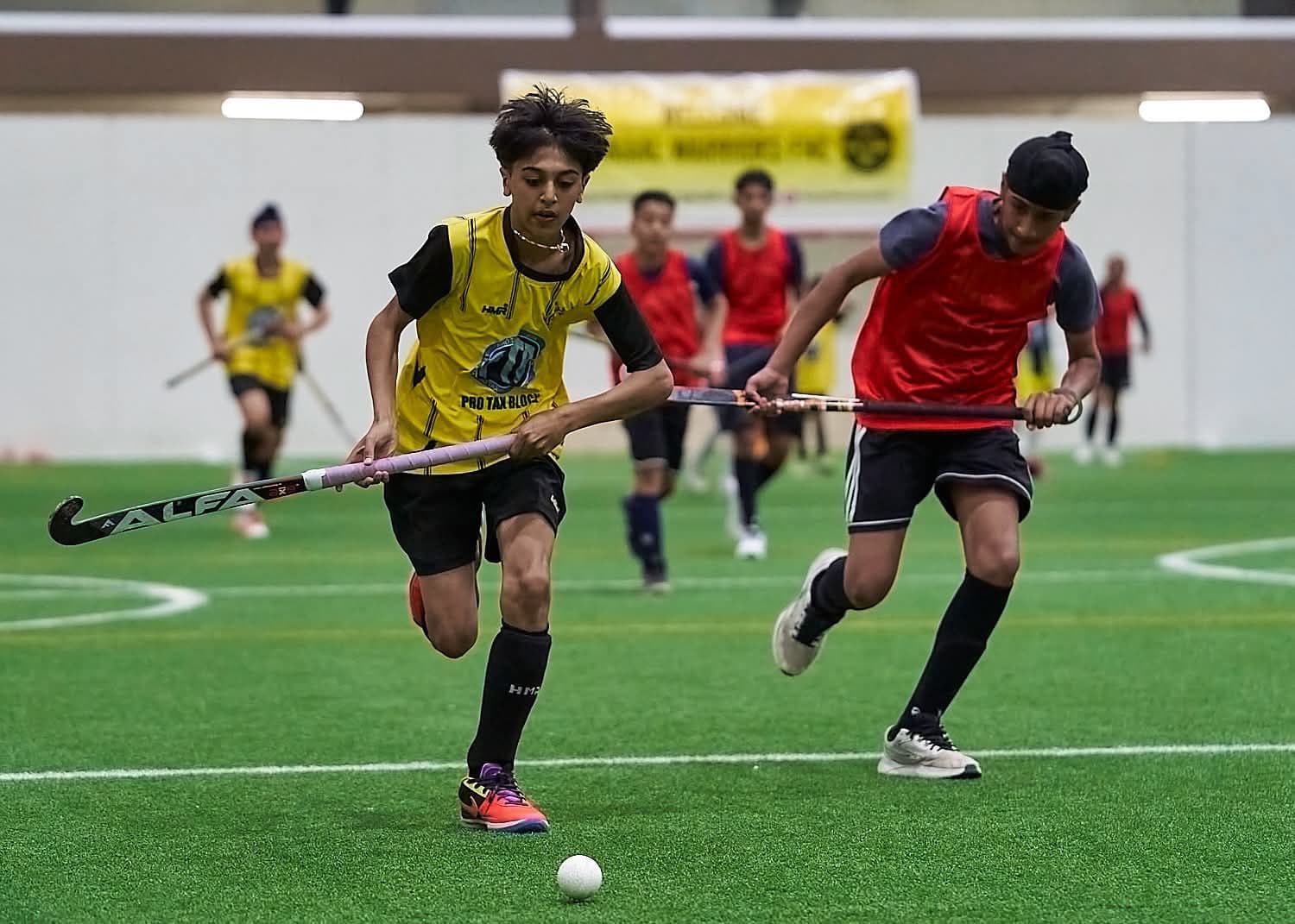 Action shot — players racing for the ball